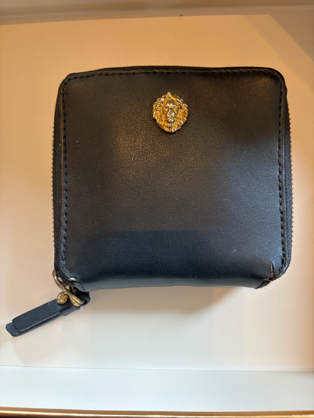 Anne Klein Black Zip-Around Wallet with Gold Lion Medallion